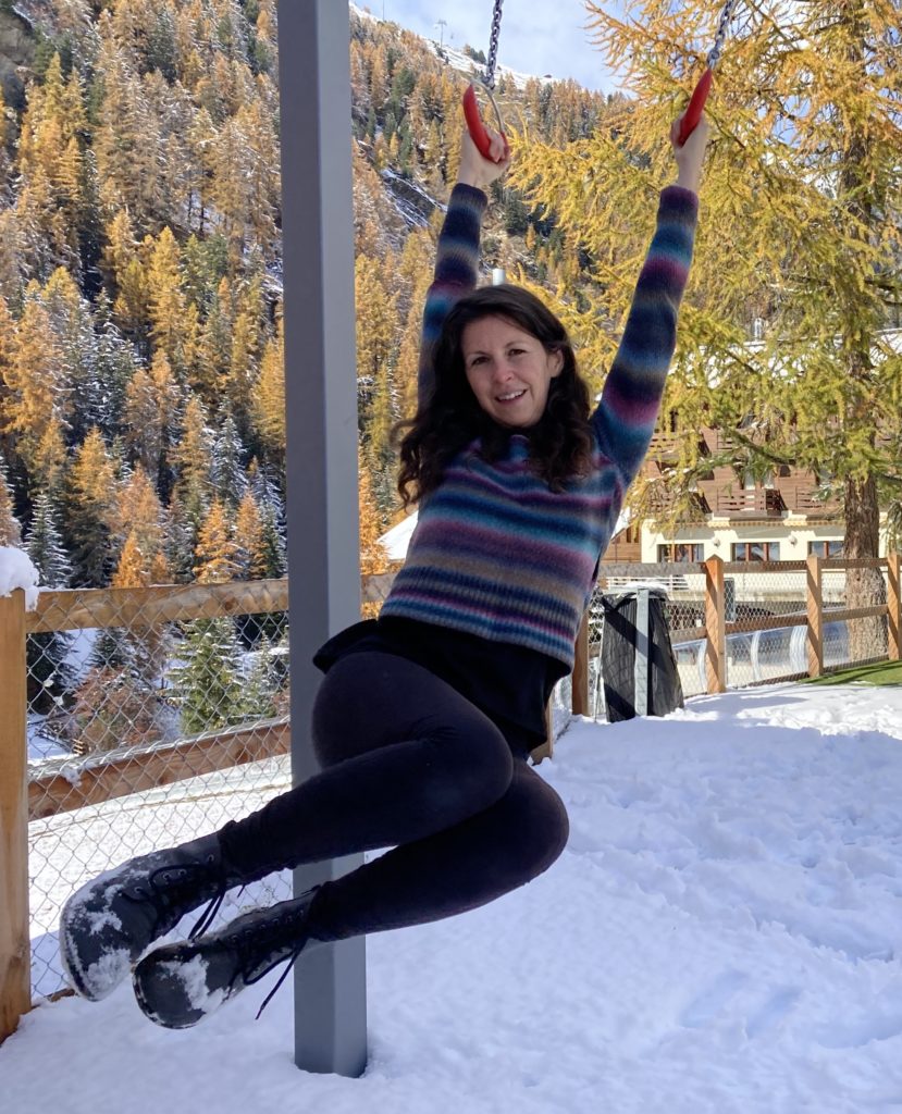 Girl swinging wearing Belenka Boots